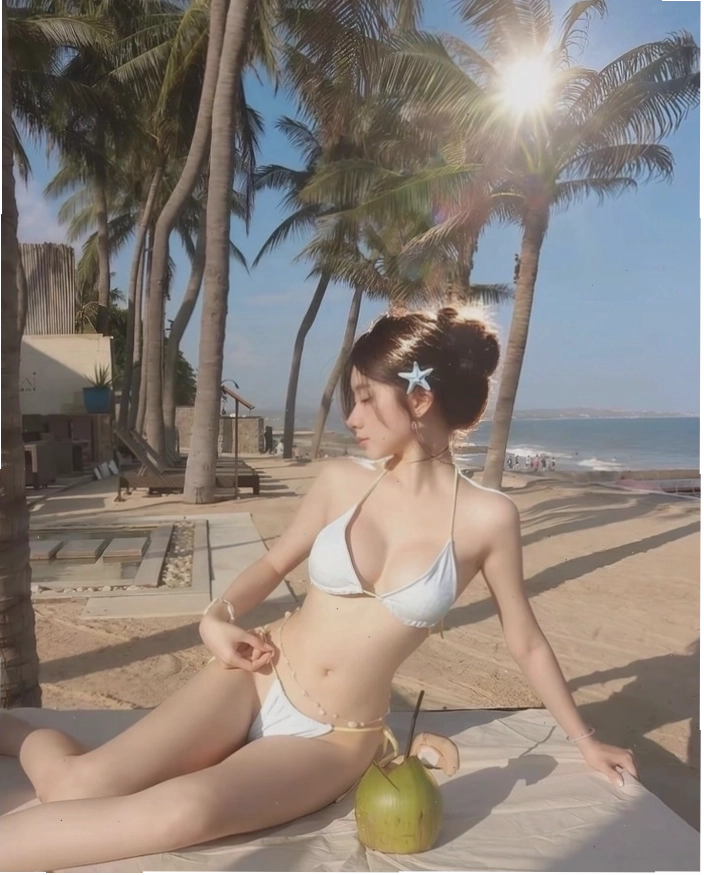Ảnh nền gái xinh mặc bikini trên bãi biển cuốn hút